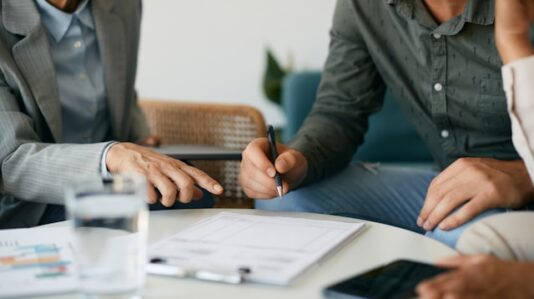 people reviewing business document