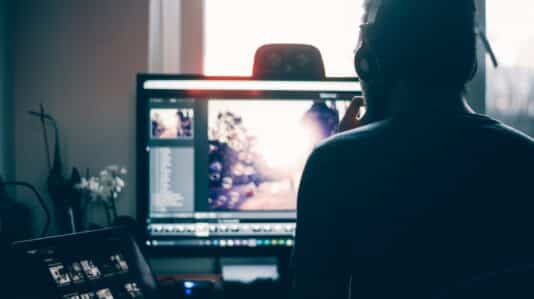 person in front of monitor