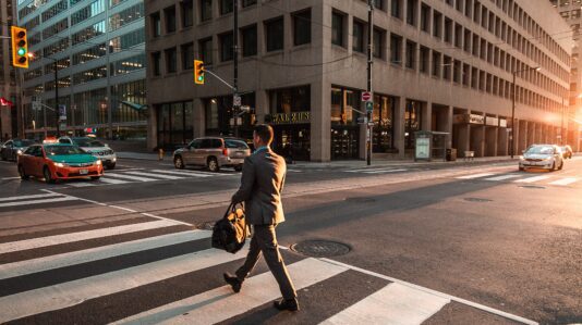 man crossing the street