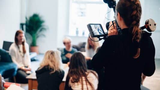 woman recording an on-going interview