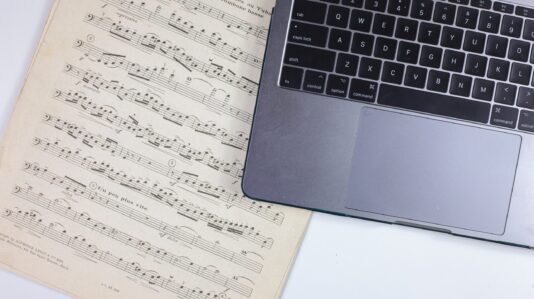 musical notes and laptop