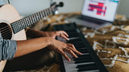 person playing a piano