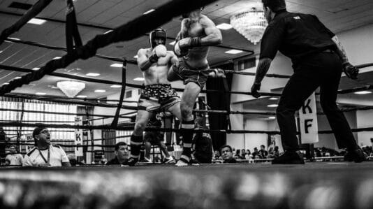 fighters sparring in the ring