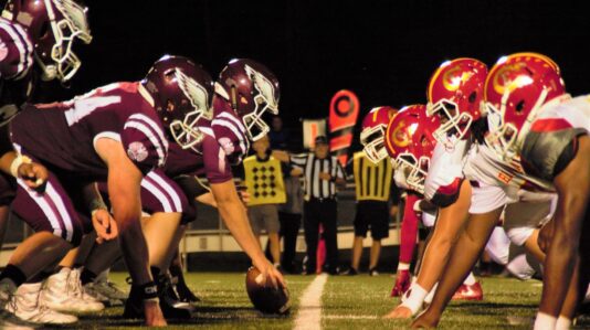 close up photo of American football players