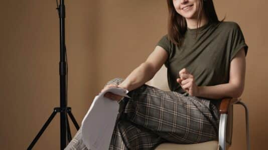 female sitting in a chair