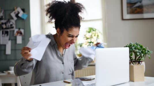 a woman looking upset from work