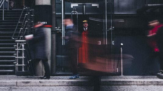 doorman on Leadenhall Street, London, UK