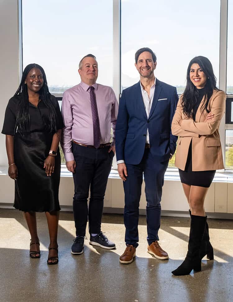 KO-TMR-DR-SS-standing-portrait-scaled2 male and female managers