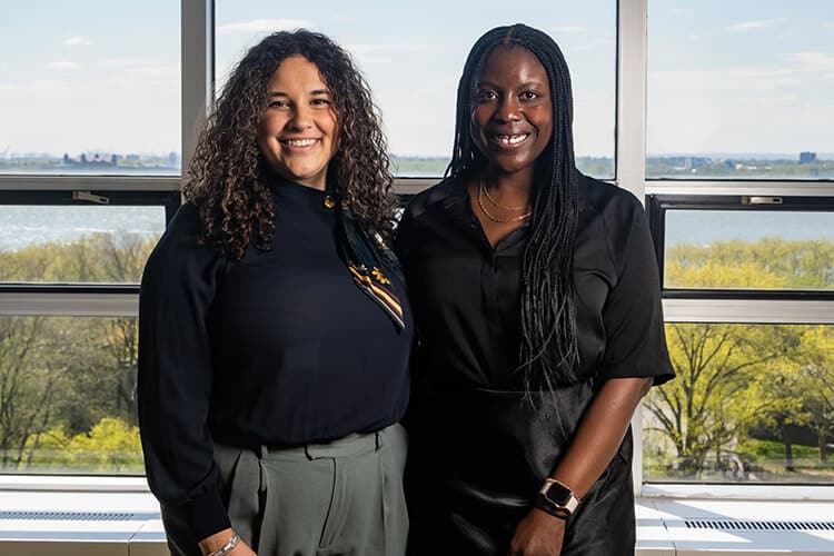 Two-women-happy-1-scaled Client team photo