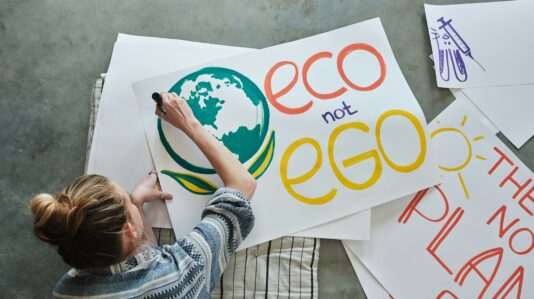 a woman painting the earth