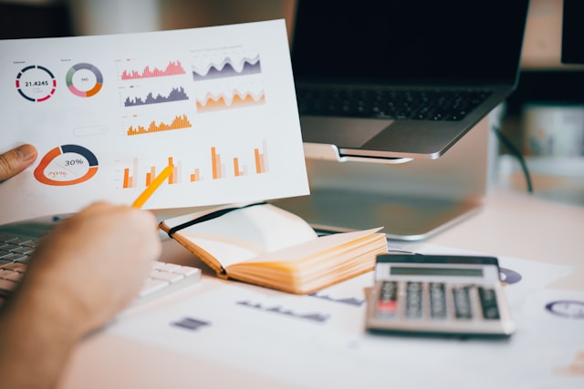 a person reviewing a financial graph