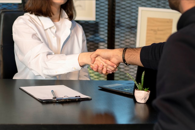shake hands after an interview