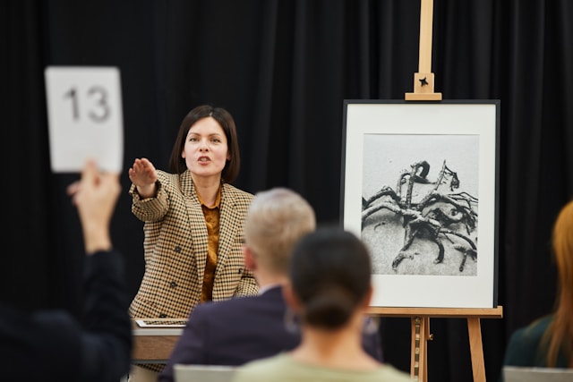 a woman doing an auction