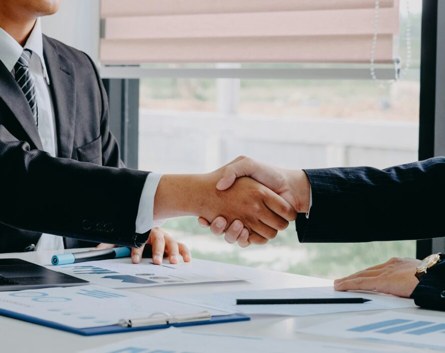 two people shaking hands