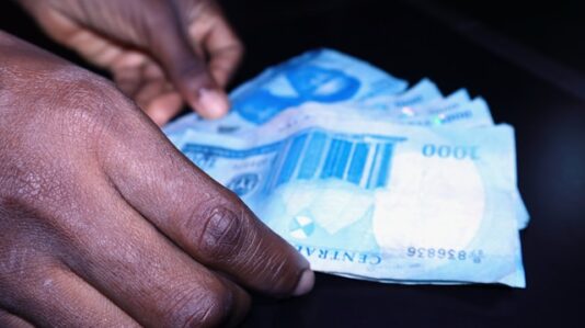 hands holding money