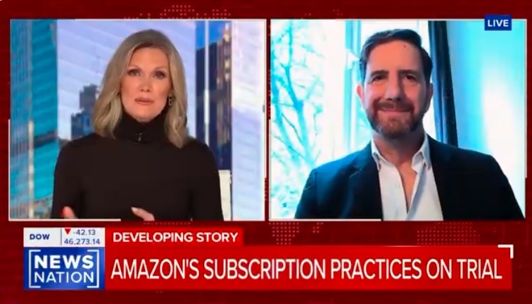 a woman anchor interviewing Domenic Romano