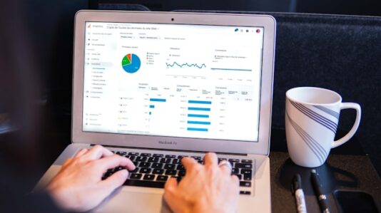 a laptop with graph display on screen