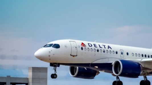 a Delta airplane prepares to land
