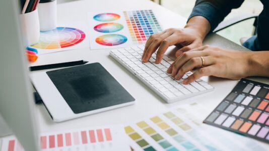 a person using a white flat keyboard