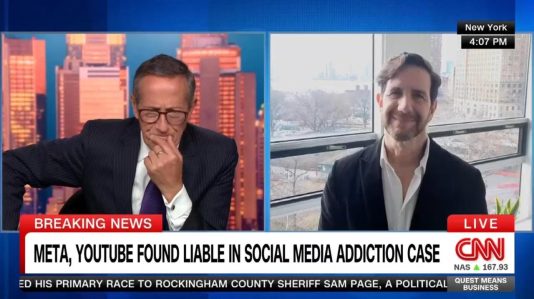 two men in a tv interview