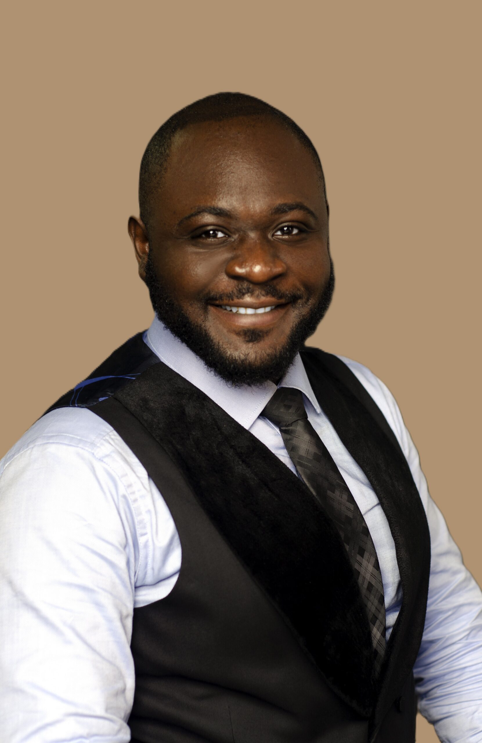 Peter Okoyomoh smiling