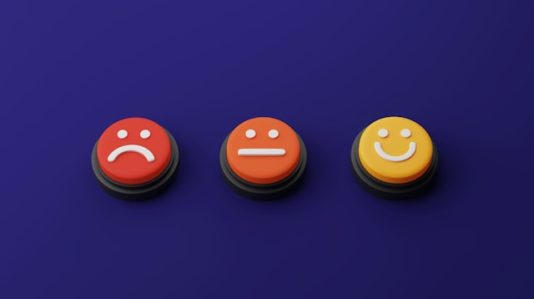 buttons with different designs: sad, normal, happy faces