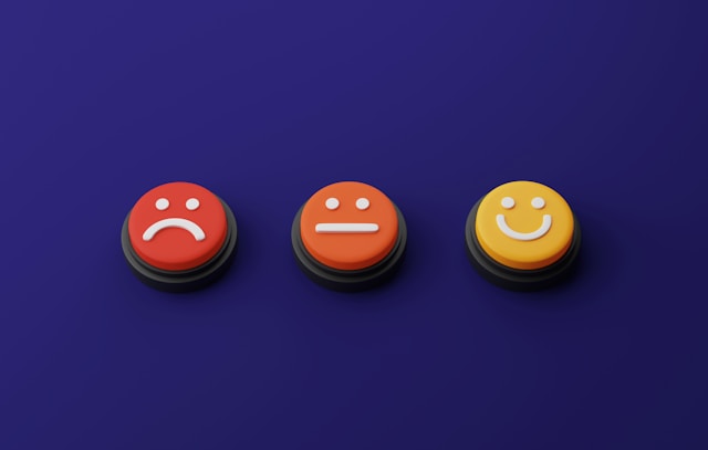 buttons with different designs: sad, normal, happy faces