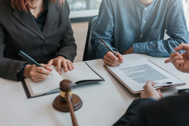 two people reviewing document